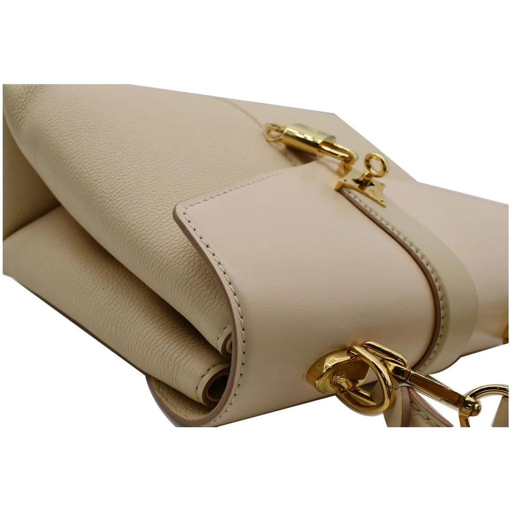 Pre-owned Grained Leather Top Handle Crossbody Bag M59705